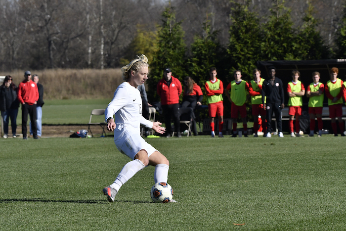Luke Muther playing soccer.