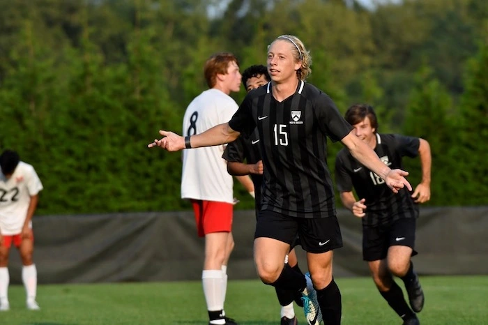 Luke Muther playing soccer.